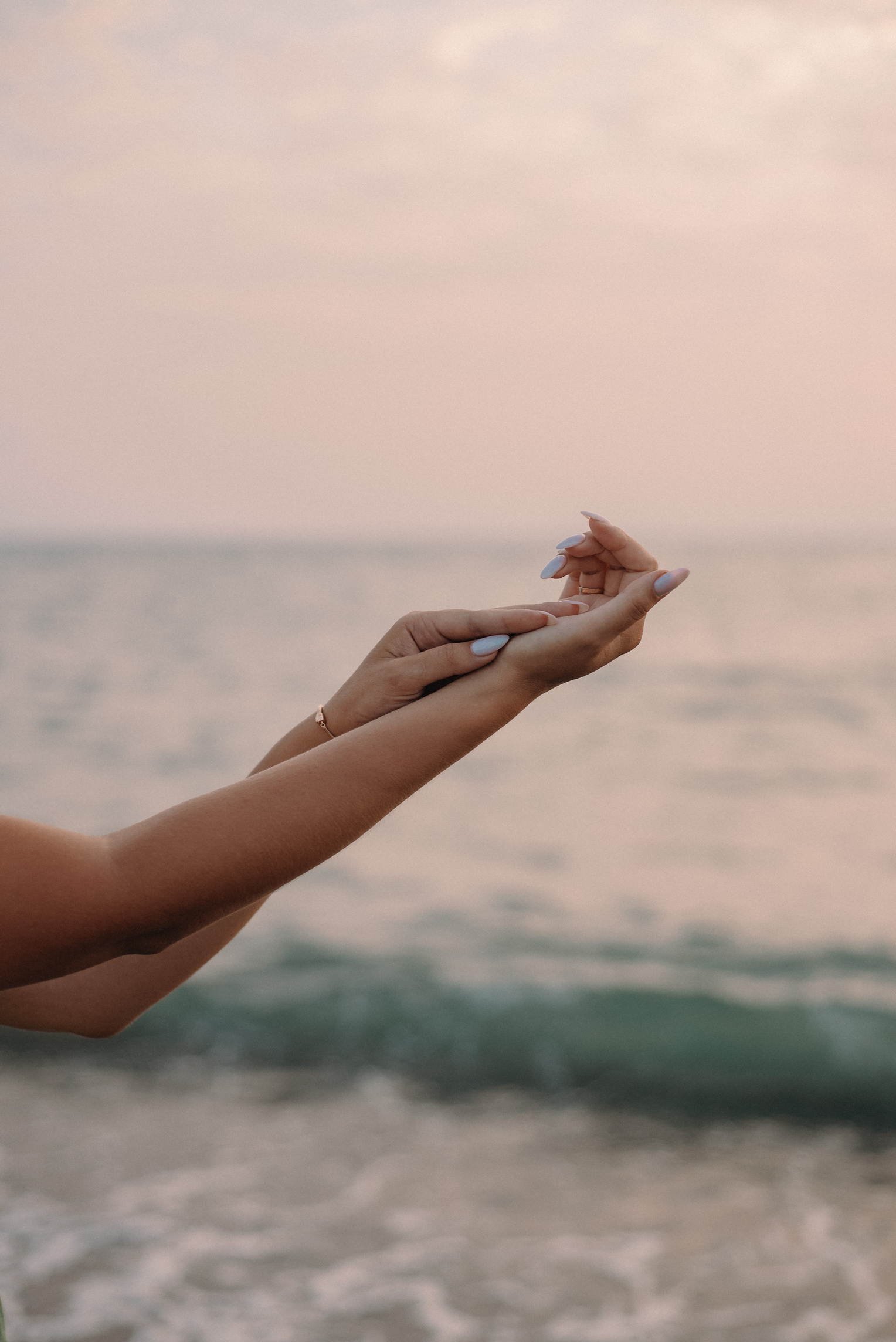 Person Holding White and Brown Leaf